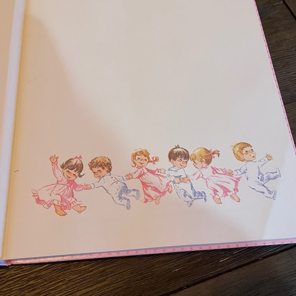 Vintage pink baby book for girl
